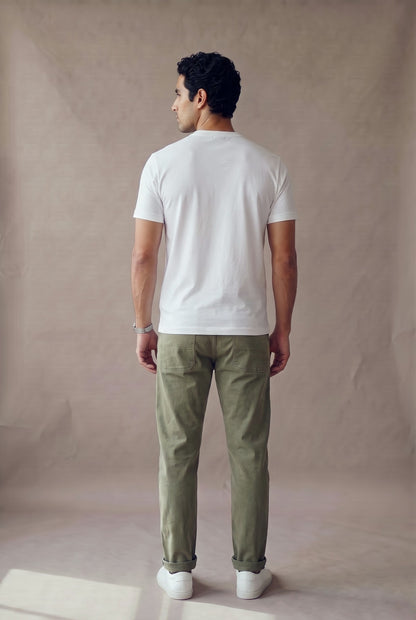 Camiseta manga corta con botones blanca para hombre, espalda en un panel limpio sin costura central ni logo